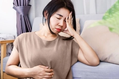 Image Gut-Brain Axis and anxiety concept with stress Asian woman have problems with digestive systems
