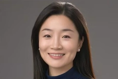 Image A woman smiling into the camera