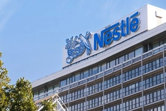 nestle building with blue and white logo and birds
