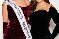 Miss Palestine and Huda next to each other, but just their bodies are shown.