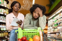 Image Couple Struggling During Financial Crisis Calculating Supermarket Prices Indoor