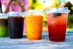 Image colorful drinks on wooden table