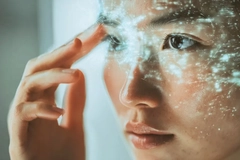 asian woman with holographic data points across face