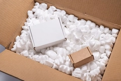 Image A box with white foamy packaging material