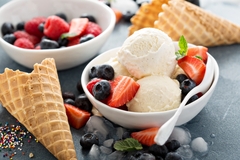 Ice cream and fruit with cone.