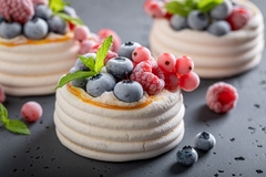 Image Fruit-based meringue dessert.