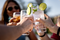 People drinking gin and tonic.