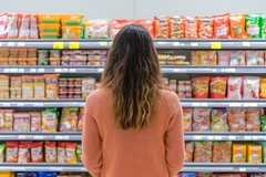 Woman shopping for junk food