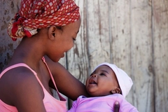 Woman holding an infant