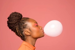 Image woman blowing gum