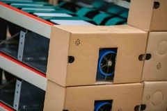 A stack of boxes with blue wheels inside