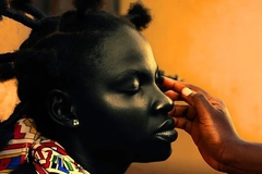 Image woman getting traditional makeup applied