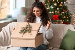 woman opening christmas present