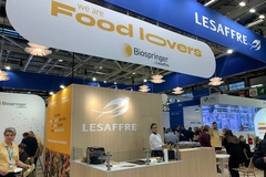 trade show booth with people