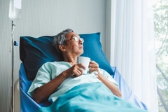 Patient in hospital bed