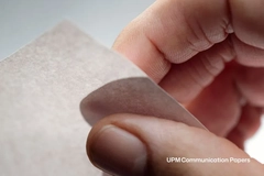 Image A person holding a piece of paper.