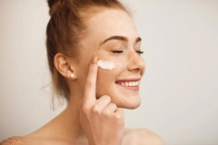 Image woman applying skin care