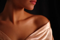 Image A woman's decolletage.