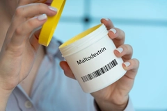 woman opening a jar of maltodextrin