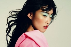 Woman with bright makeup and clothes