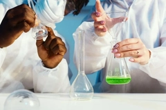 Scientists in a lab working with schemicals
