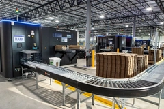 Image A conveyor belt in a warehouse