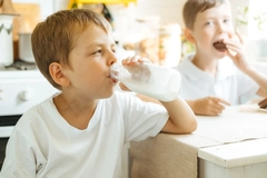 Image Schoolchildren drinking milk.