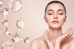 Image Glassy molecules next to a woman's face.