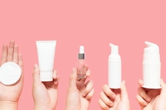 Image hands holding bottles