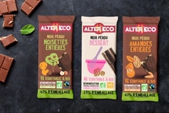 Image Chocolate bars in paper-based packaging.