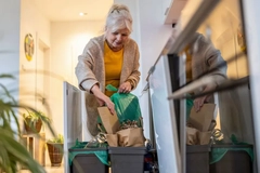 Image old woman recycling