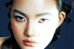 Woman with trendy hair style and light on her face