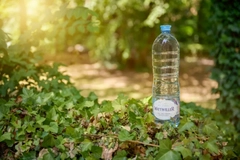 A water bottle in the outdoors