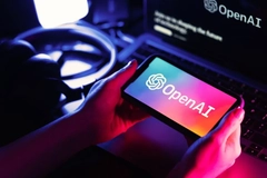 Image OpenAI logo on a multicolored phone screen