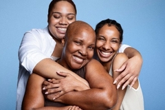 three women hugging