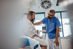Image Overweight man in hospital