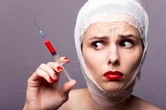 Image woman holds syringe