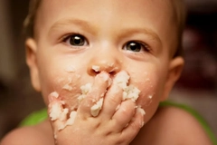 Image baby eating food