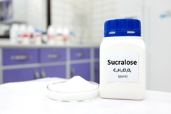 white plastic bottle with blue cap white bottle of sucralose with blue cap