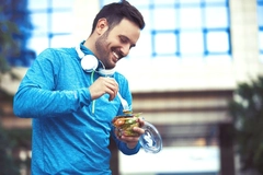 Man eating a small salad