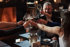 people drinking wine at restaurant