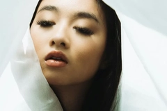 Young woman with makeup look in white background