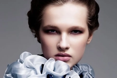 Image High-fashion woman with stylized makeup