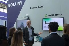 A person standing in front of a group of people