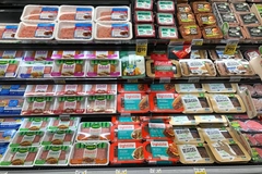 Image Plant-based meat on supermarket shelf.