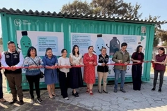 Image recycling facility cutting ribbon