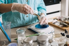 Image Hands making a natural beauty product.