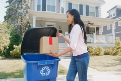 woman recycles