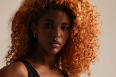 Image Latin American woman with curly hair