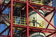 man on oil refinery